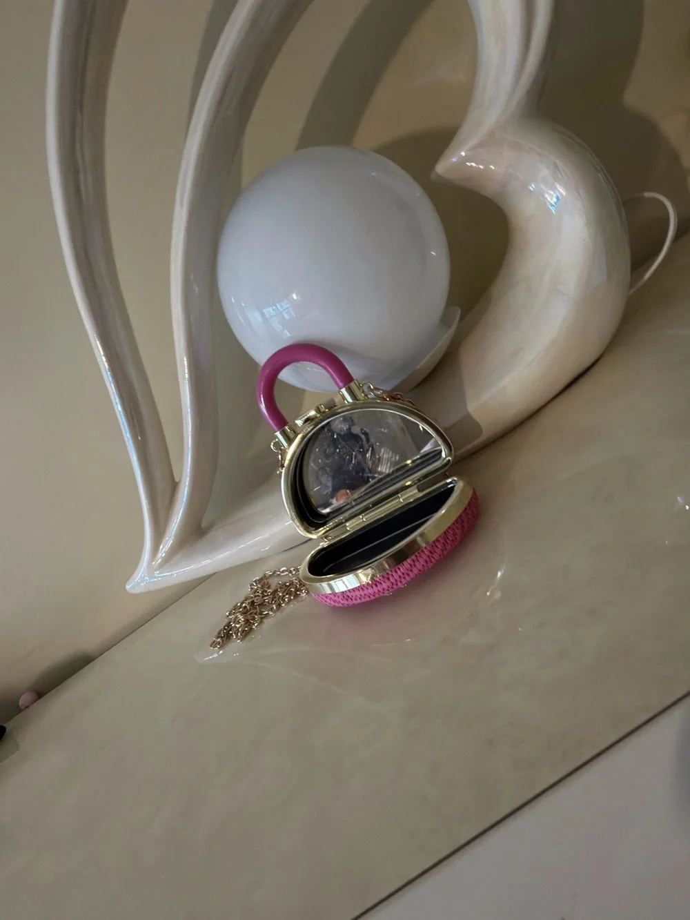 Chic  Pink Mini Dome Crossbody Clutch with Gold Chain.